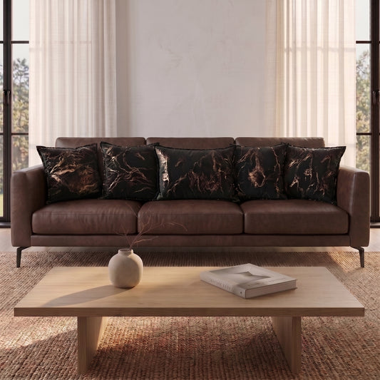 Golden Smoke cushion cover set styled in an elegant neutral interior
