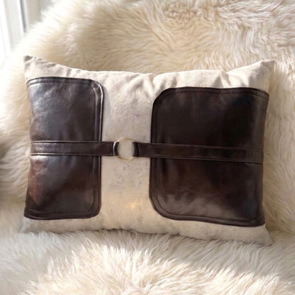 Ivory Belmont rectangular lumbar pillow cover with dark brown faux-leather panels and gold-tone ring hardware