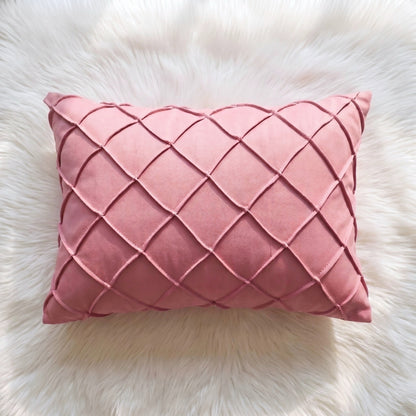 Dusty rose velvet lumbar pillow cover with raised handwoven geometric lattice detailing across the front.
