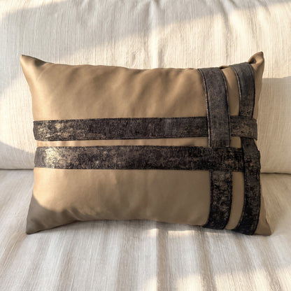 Taupe velvet lumbar pillow cover with intersecting dark printed velvet bands arranged in an asymmetric geometric pattern.
