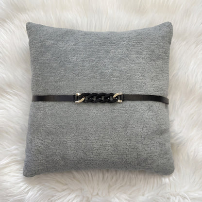 gray Dominion gray chenille square pillow cover with black strap and chain detailing