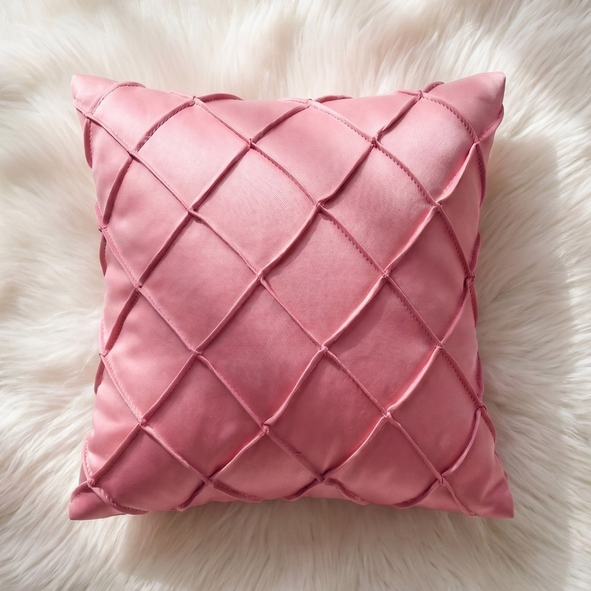 Dusty rose velvet square pillow cover with dimensional handwoven diamond lattice pattern.
