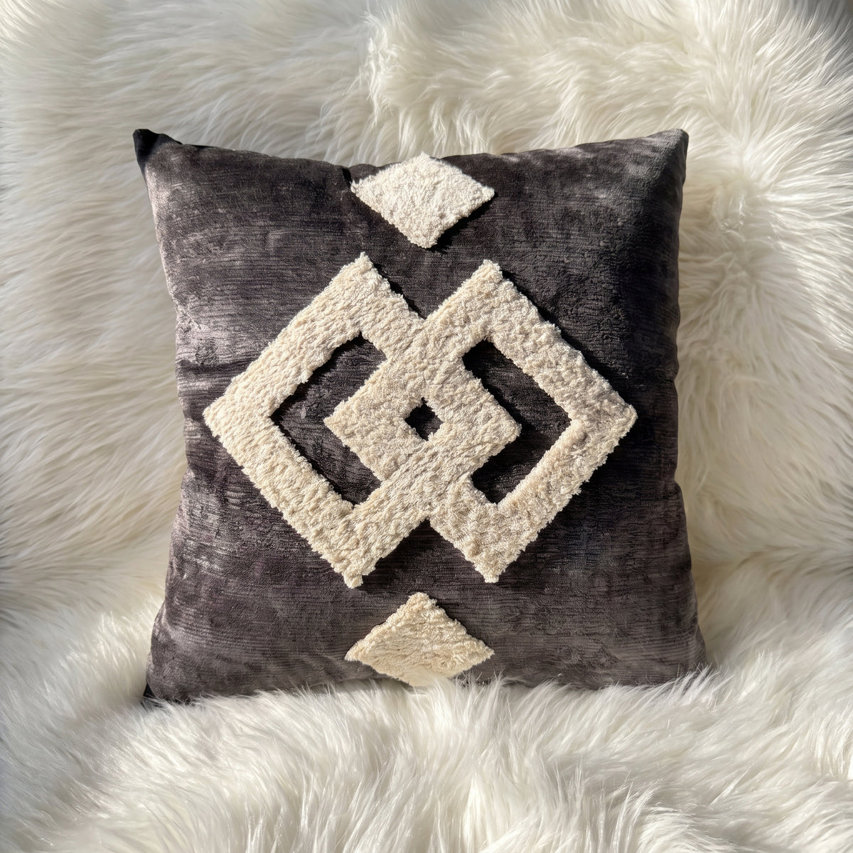 Graphite Mirage graphite square pillow cover with raised ivory geometric detailing