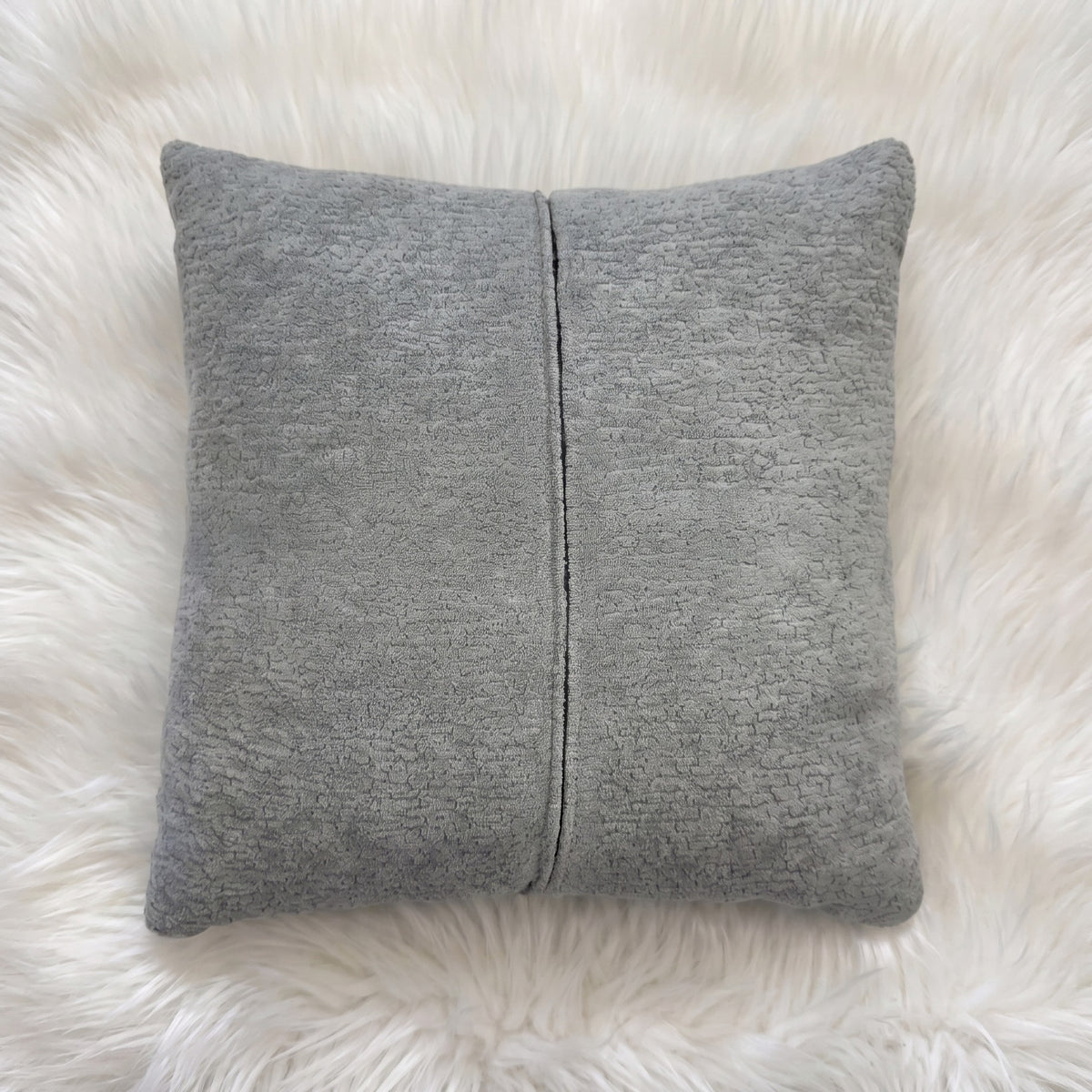 Back and concealed zipper detail of Gray Dominion gray chenille pillow cover