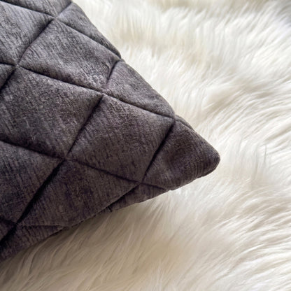 Close-up of Graphite Mirage dimensional diamond-quilted fabric texture