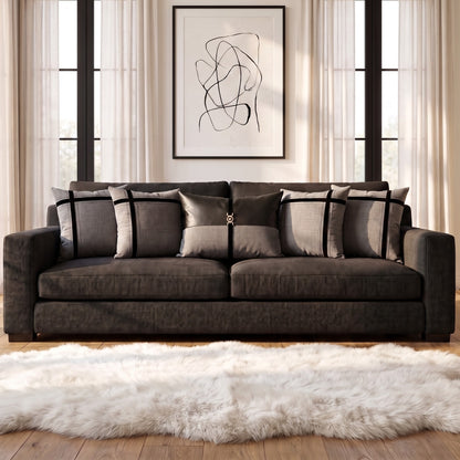 Charcoal Chic cushion cover set styled on a  sofa
