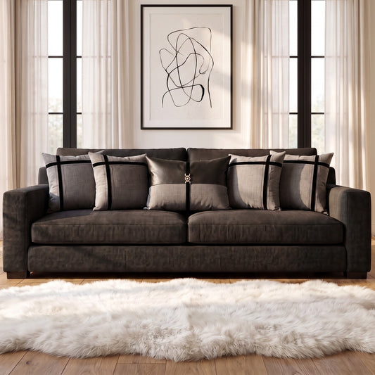 Charcoal Chic cushion cover set styled on a  sofa
